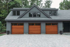 NH architectural photographer, Kerry Struble. Lake Winnipesaukee lakefront luxury home by Jason Drouin Custom Homes.