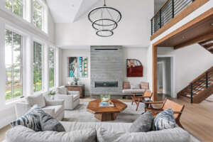 NH architectural photographer, Kerry Struble. Lake Winnipesaukee lakefront luxury home by Jason Drouin Custom Homes.