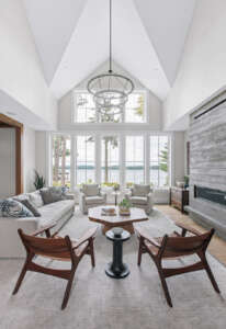 NH architectural photographer, Kerry Struble. Lake Winnipesaukee lakefront luxury home by Jason Drouin Custom Homes.