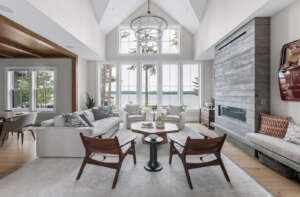 NH architectural photographer, Kerry Struble. Lake Winnipesaukee lakefront luxury home by Jason Drouin Custom Homes.