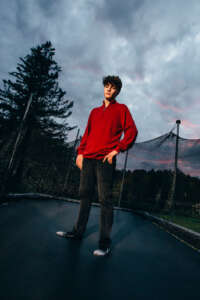 Maine highschool senior portrait by kerry struble, NH portrait artist. Trampoline senior photo session.